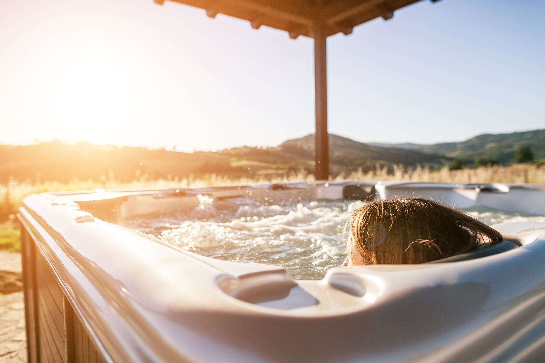 Woman in whirlpool hot tub